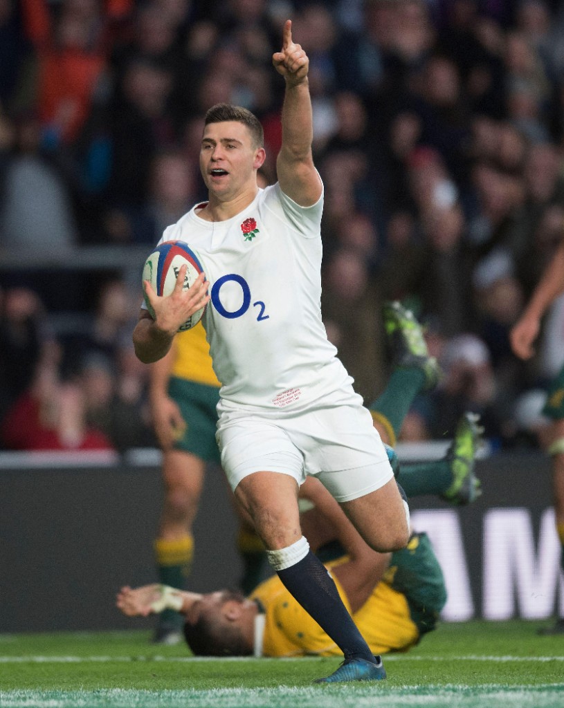 England rugby player celebrating on the pitch during an international match